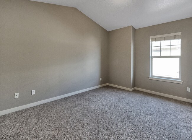 Building Photo - 2BR + 2.1BA Corner Townhome-Style Condo — Dual Primary Suites, Attached Garage & Most Utilities I...
