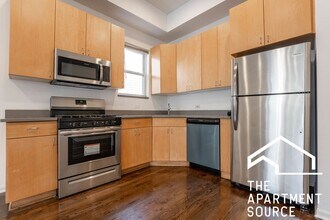 Building Photo - Spacious 4BR/2BA in Logan Square — Steps f...