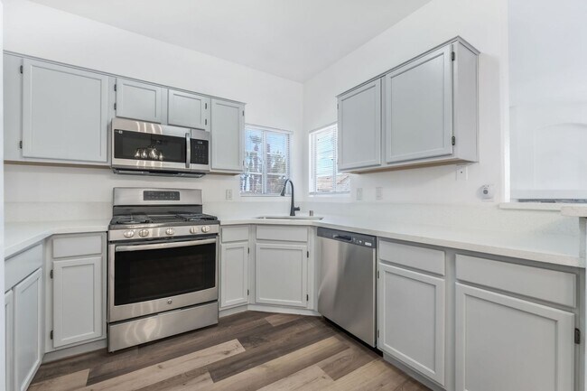Building Photo - Modern Gated Condo with Stylish Upgrades, Poolside Location & Private Balcony!