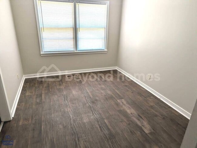 Building Photo - Updated Bungalow with Massive Deck and Fully Fenced Yard!