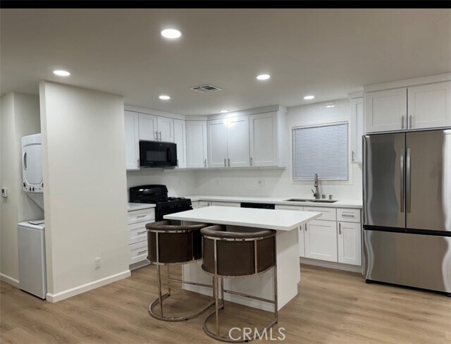 Building Photo - 8448 Aura Ave