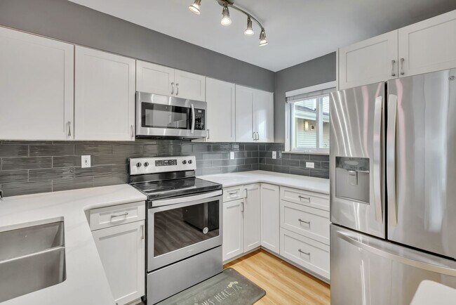 Building Photo - Two-Story Condo Near Delridge Library with Private Courtyard & Easy Downtown Access