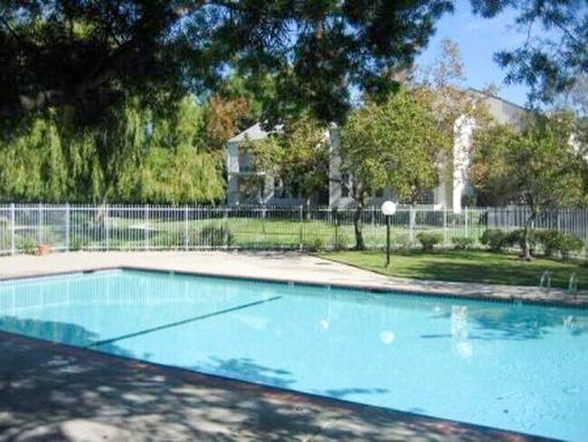 Building Photo - Prime Fremont Living! Updated 2BR Condo Near BART, Central Park & Lake Elizabeth
