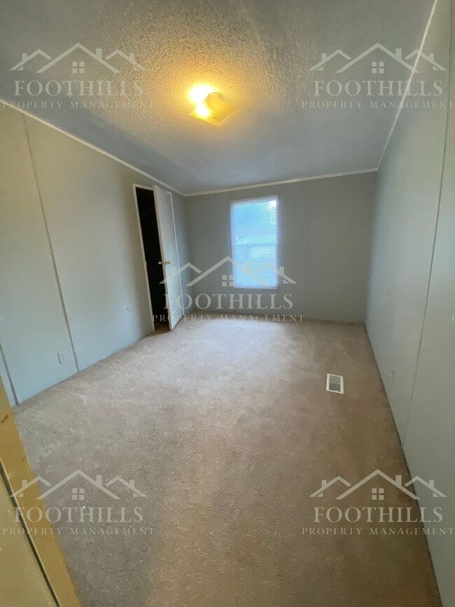 Building Photo - Peaceful Pondside Living – 3BR/2BA Home wi...