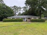 Building Photo - 5855 Woodvale Dr