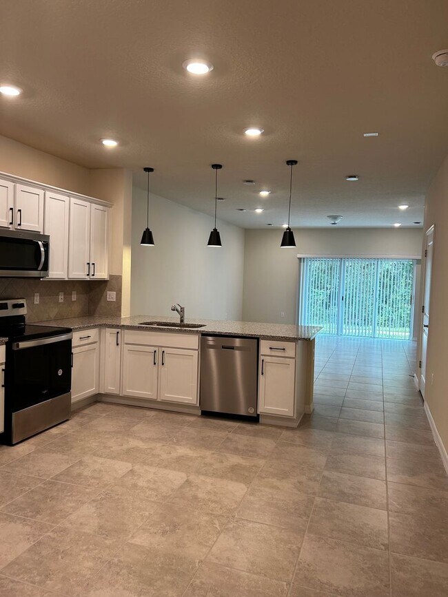 Building Photo - Move In ASAP!! - Brand New 3 bedroom 2.5 bath Townhouse for rent in Kissimmee, FL.