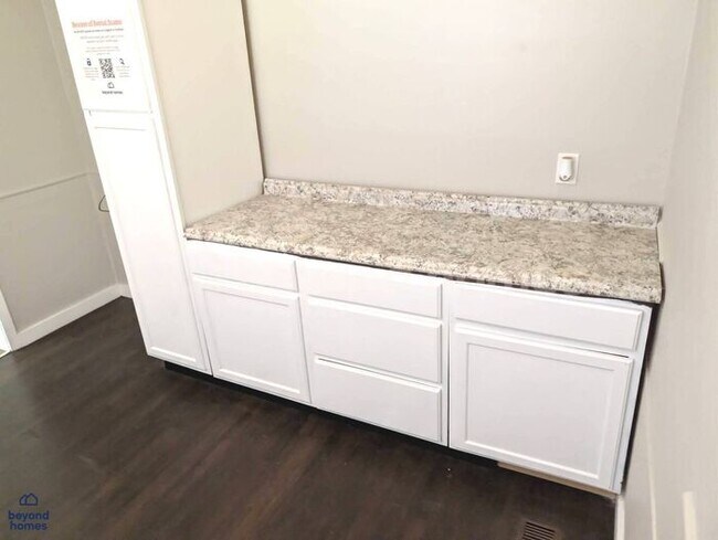 Building Photo - Updated Bungalow with Massive Deck and Fully Fenced Yard!