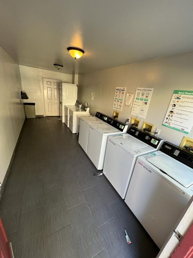 Building Photo - 2 Bedroom 1.5 Bath Townhome. Gated Community. Upgraded & 2 Parking Spaces