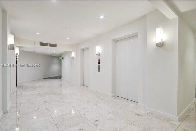 Building Photo - 19380 Collins Ave