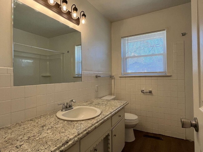 Building Photo - 4-Bedroom Home with Spacious Fenced Yard