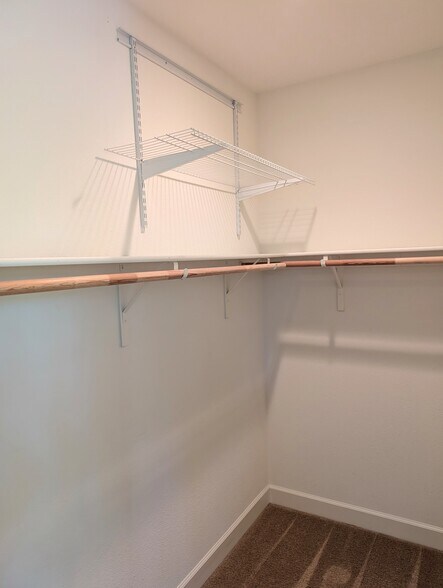 Main Bedroom Closet with shelves - 15925 Piazza Way