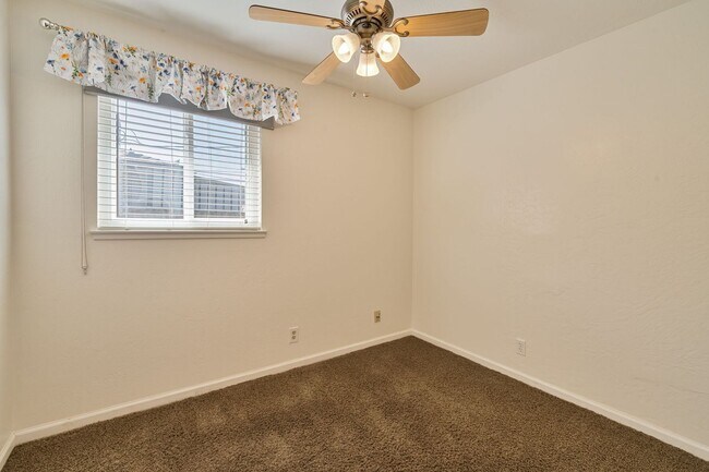 Building Photo - 3BR + Office Home in Excellent Condition with Storage Sheds and Garage Workspace!