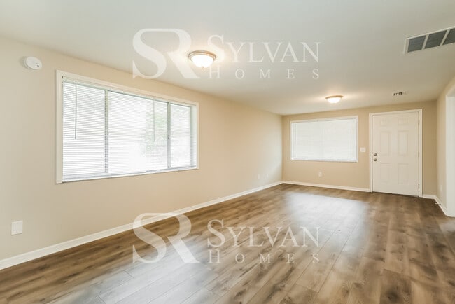 Building Photo - The living is easy in this 3 bedroom, 2 bathroom home!