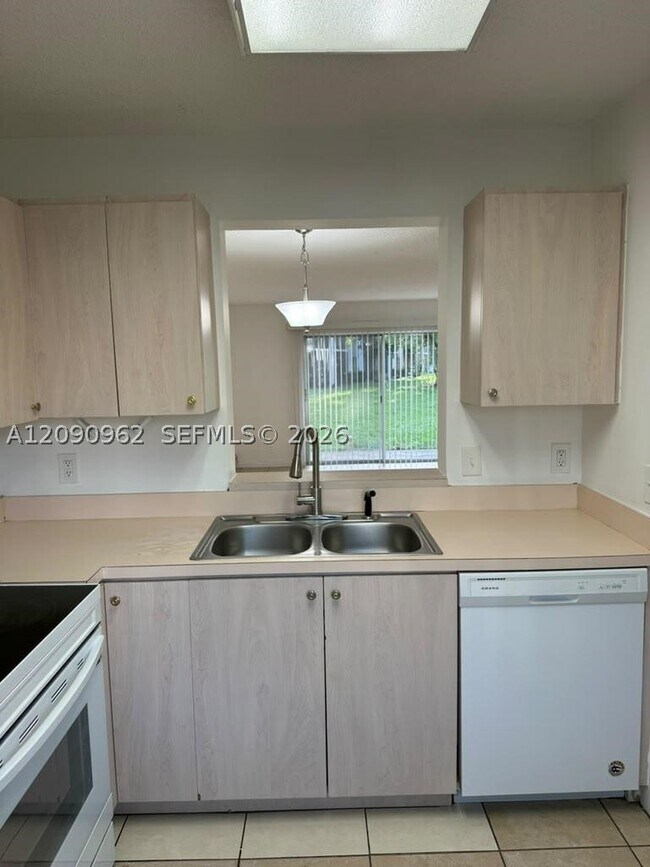 Building Photo - 8740 N Sherman Cir