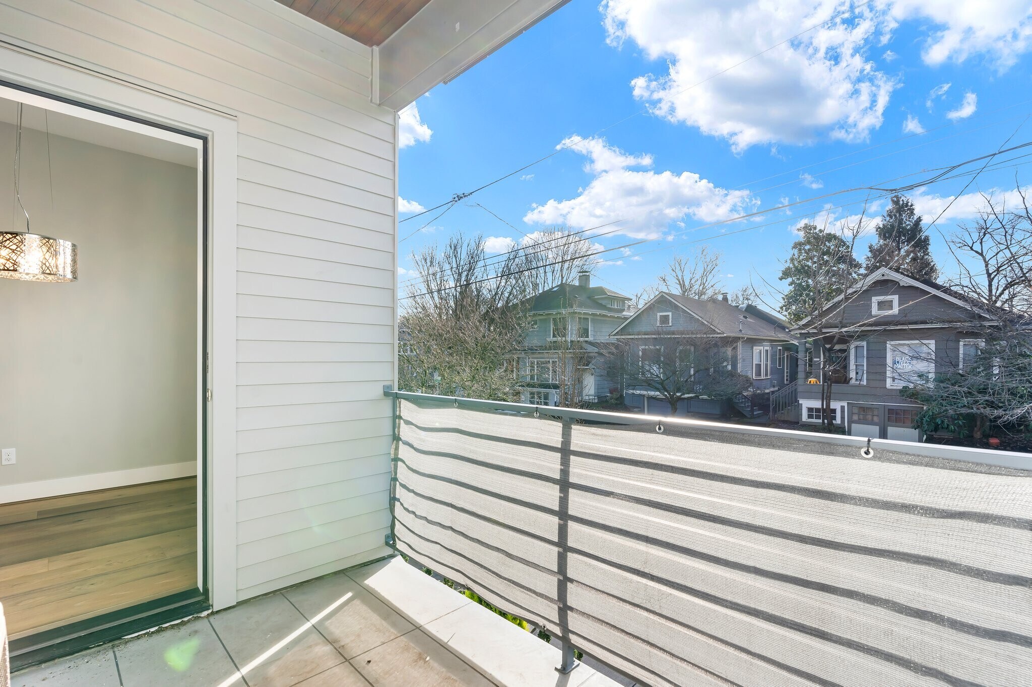 Upstairs outdoor space accessible from the living room/kitchen area. - 2335 NE Couch St