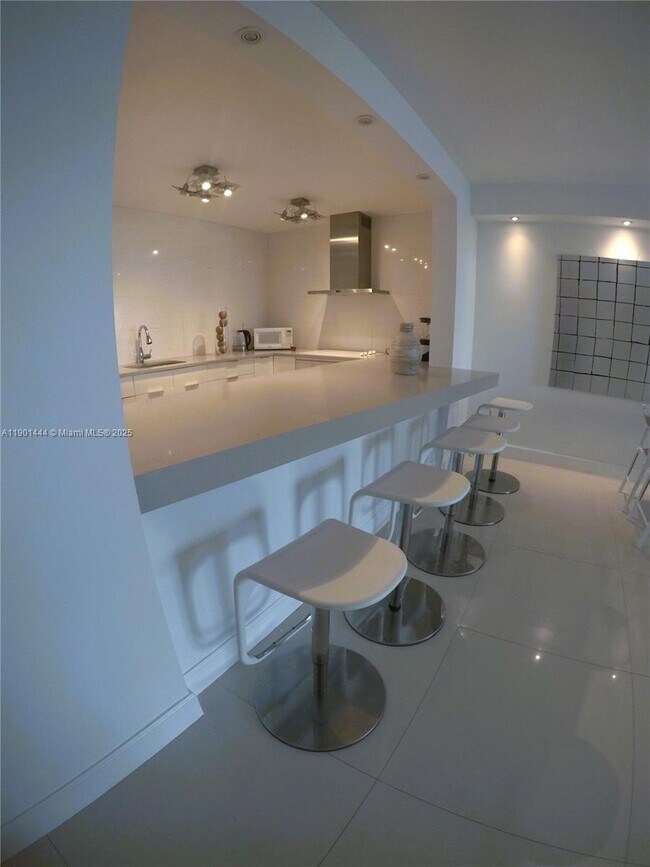 Building Photo - 19390 Collins Ave