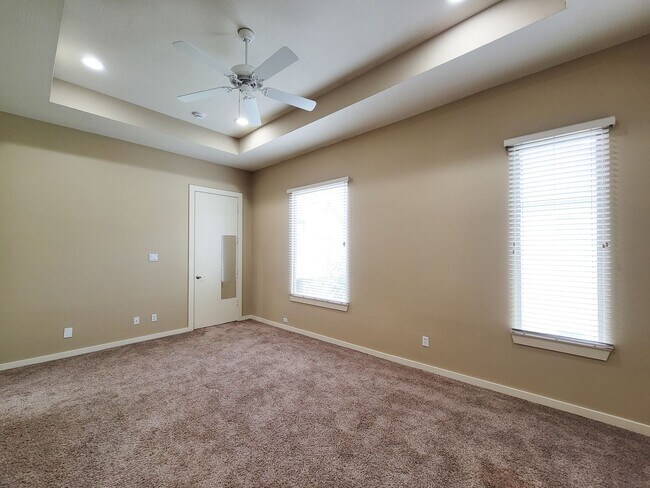 Building Photo - Elegant Gated Townhome Offering Unparallel...