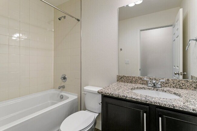 Building Photo - Spacious Banning Lewis Home with Finished ...