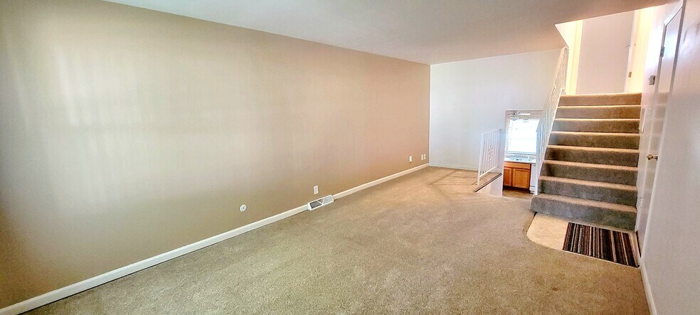 Living room and nook - 5205 N Montclair Ave
