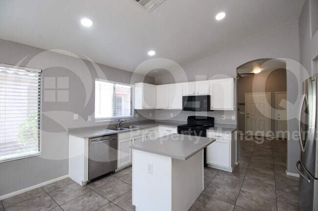 Building Photo - 14867 W Acapulco Ln