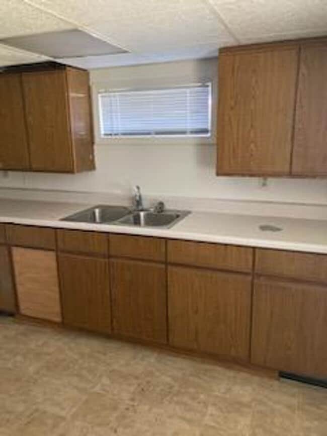 Building Photo - $900 - 2 Bedroom 1 Bath Duplex - Close to South Dakota School of Mines!