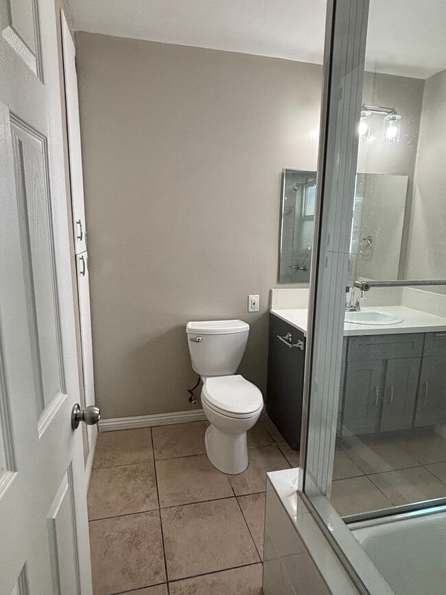 Building Photo - Cozy, Updated, and Pet-Friendly — Your New...