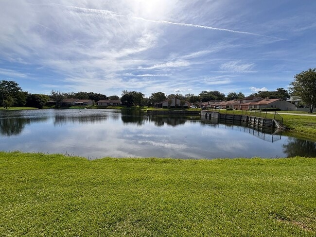 Building Photo - 2 Bed 2 Bath Luxury Waterfront Townhome with Screened Lanai & Garage!