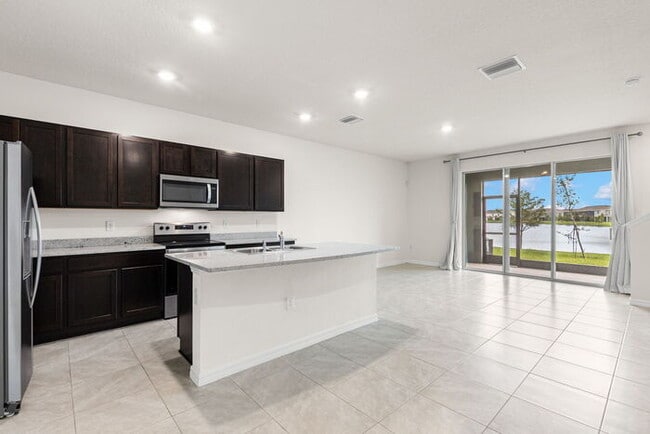 Building Photo - LIKE NEW Townhome For Rent in Mangrove Point!