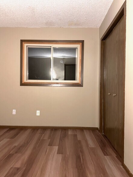 New flooring. Upstairs bedroom 1 - 8016 Zane Ave N