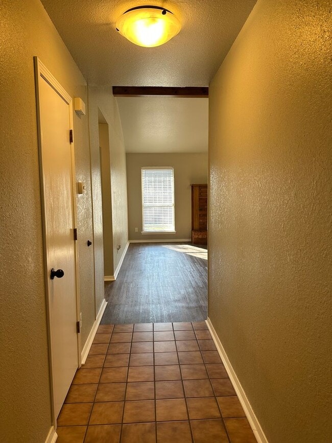 Building Photo - Clean, updated home on a corner lot with privacy fence and storage shed.