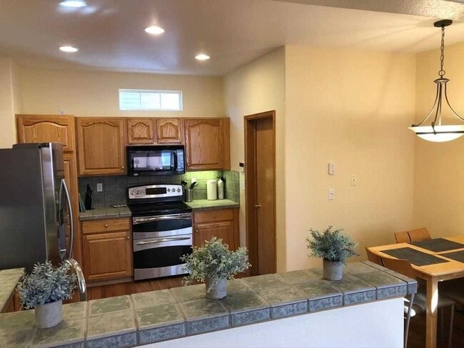 Building Photo - Luxury four bed four bath patio home avail...