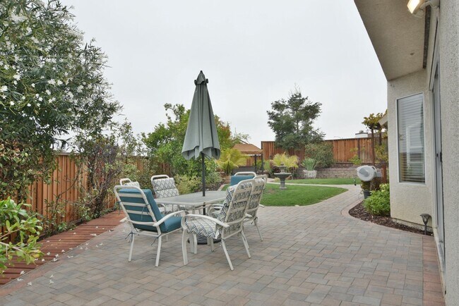 Building Photo - Beautiful 4 Bedroom 3 Bath Evergreen Home with Stunning Spacious Backyard!