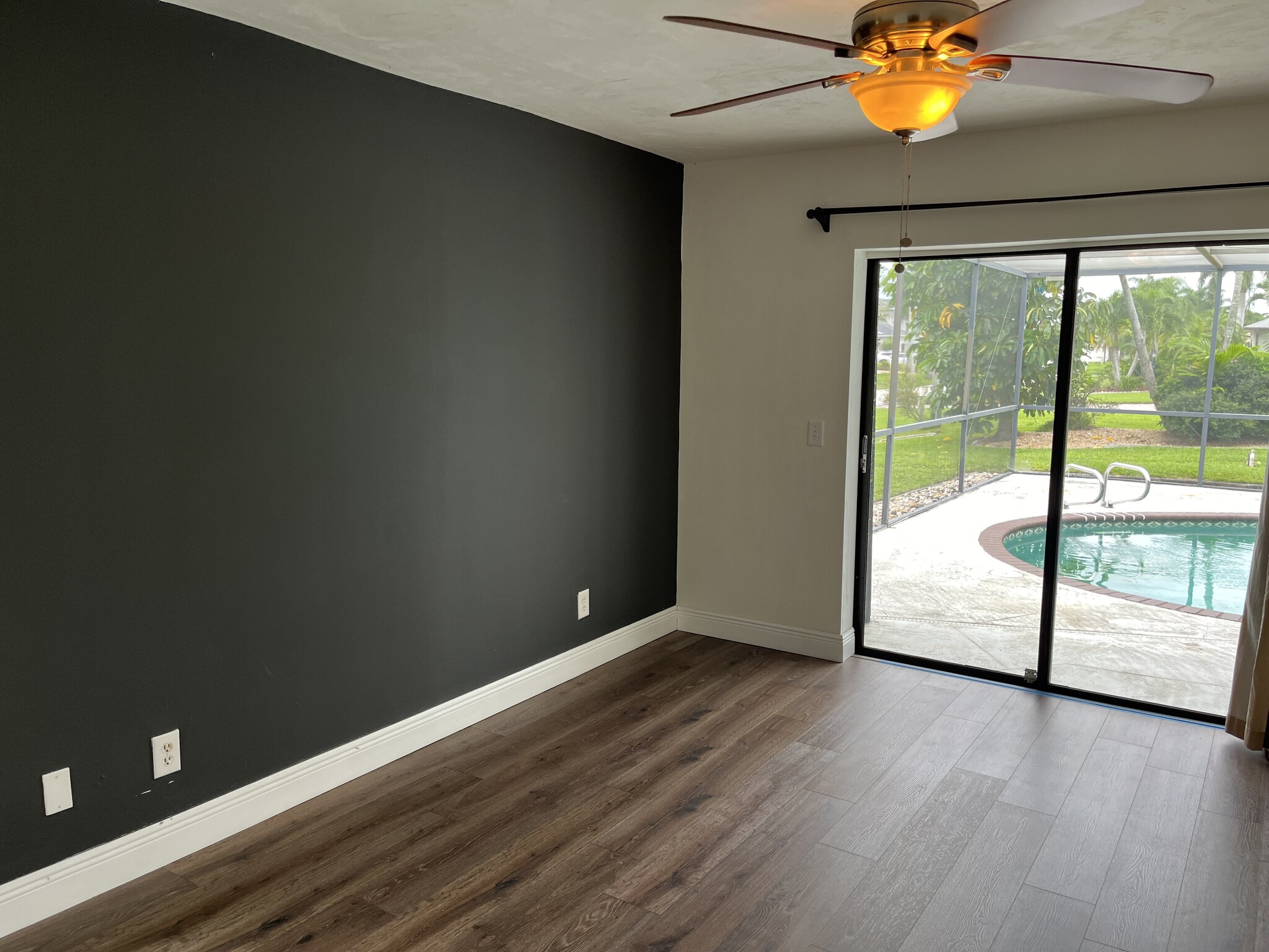 Primary bedroom has sliders to the pool. - 2316 Everest Pky