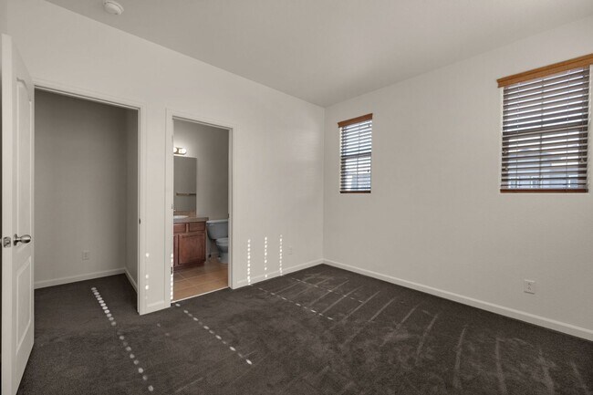 Building Photo - Beautiful 2 bdrm end unit with attach 2 car garage