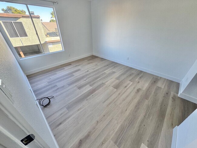 Building Photo - BRIGHT 2-BEDROOM CONDO NEAR STRIP & UNLV W/ PRIVATE BALCONY