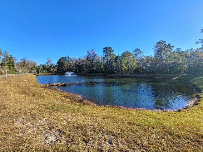 Building Photo - Welcome to this charming 3-bedroom, 2-bath...