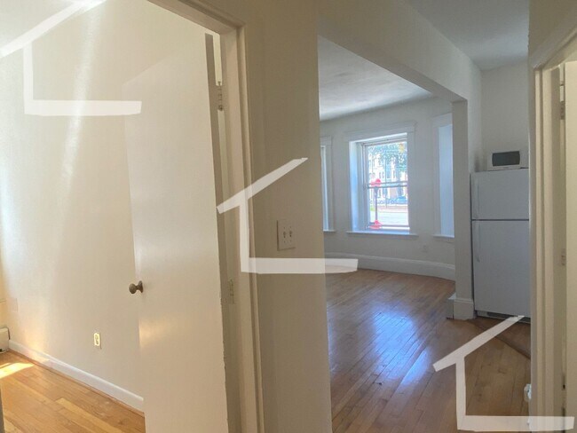 Building Photo - Ridiculous renovation in the living room including 'metal object'