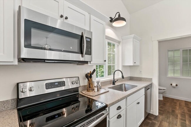 Building Photo - "Luxurious 5-Bedroom Spokane Retreat with Pool, Guest Suite, and Stunning Finishes!"