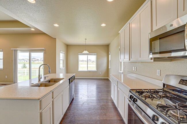 Building Photo - Stunning 5-Bedroom Home with Lake Views in...