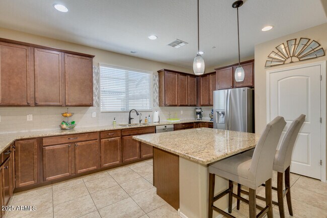 Building Photo - 21450 W Almeria Rd