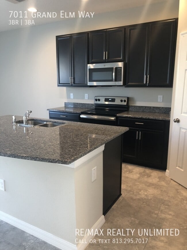 Building Photo - 7011 Grand Elm Dr