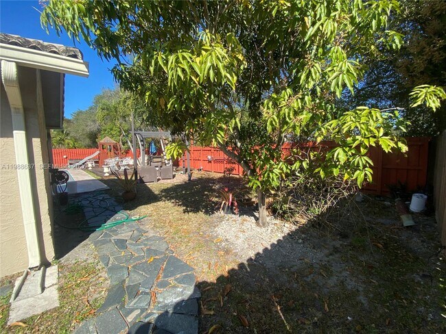 Building Photo - 10981 NW 7th St