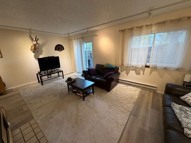 Building Photo - Spacious 3BR Townhome | 50 Yards to Coal Creek Trail!!