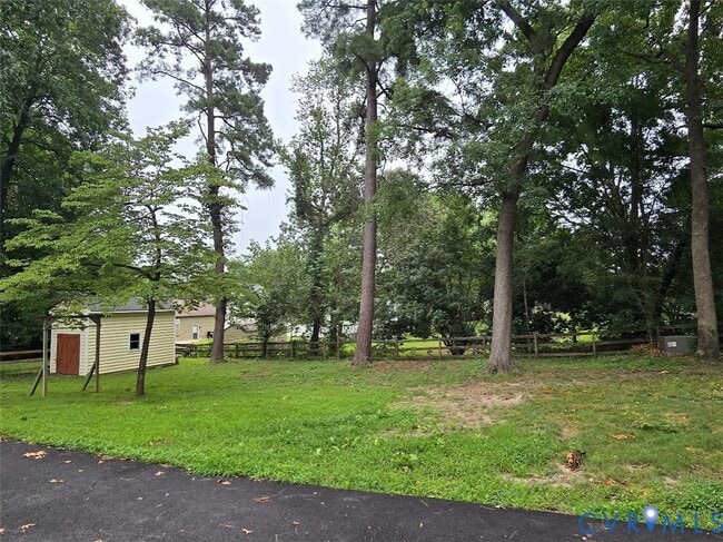 Building Photo - 8312 Soft Wind Dr