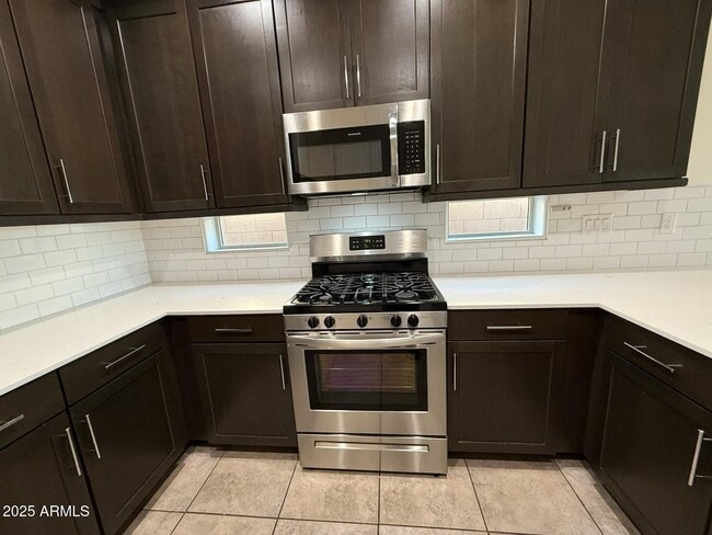 Building Photo - 3823 S 64th Dr