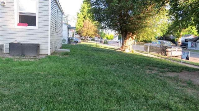 Large fully fenced yard with mature trees. - 1505 E. Hayden Street