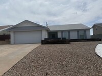 Building Photo - 3 Bedroom 2 Bathroom Home Close Neighborhood Wal Mart and NMSU-A