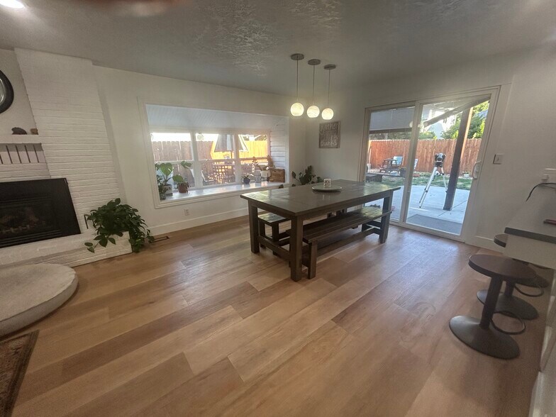 Dining room with countertop seating - 10377 W Alliance St