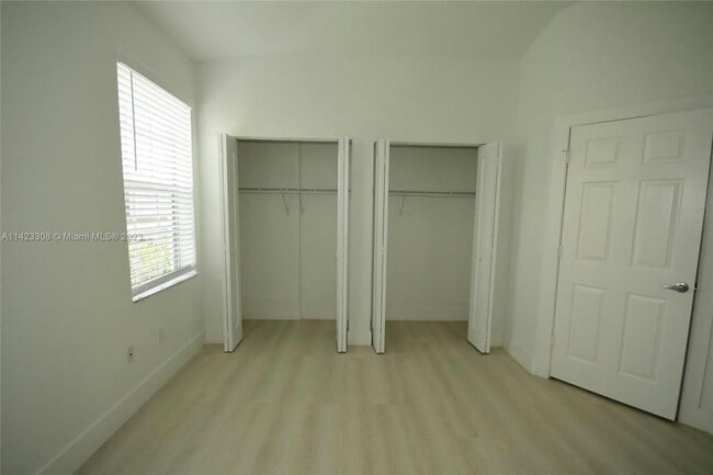 Double his and her closet - 705 SW 148th Ave