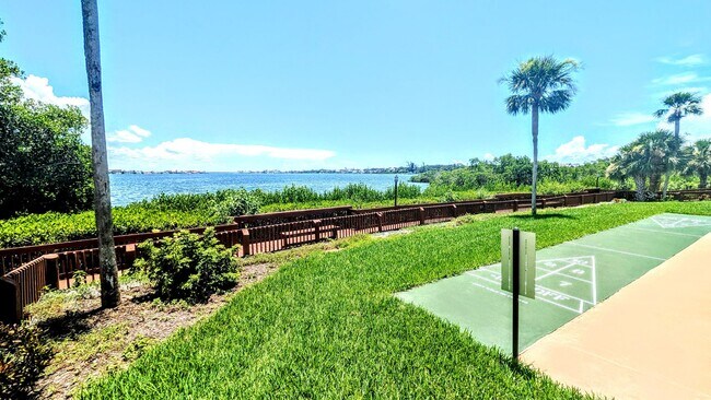 Building Photo - LEASE PENDING Annual/Seasonal turnkey furnished 2/2 end townhome in waterfront community by Siest...